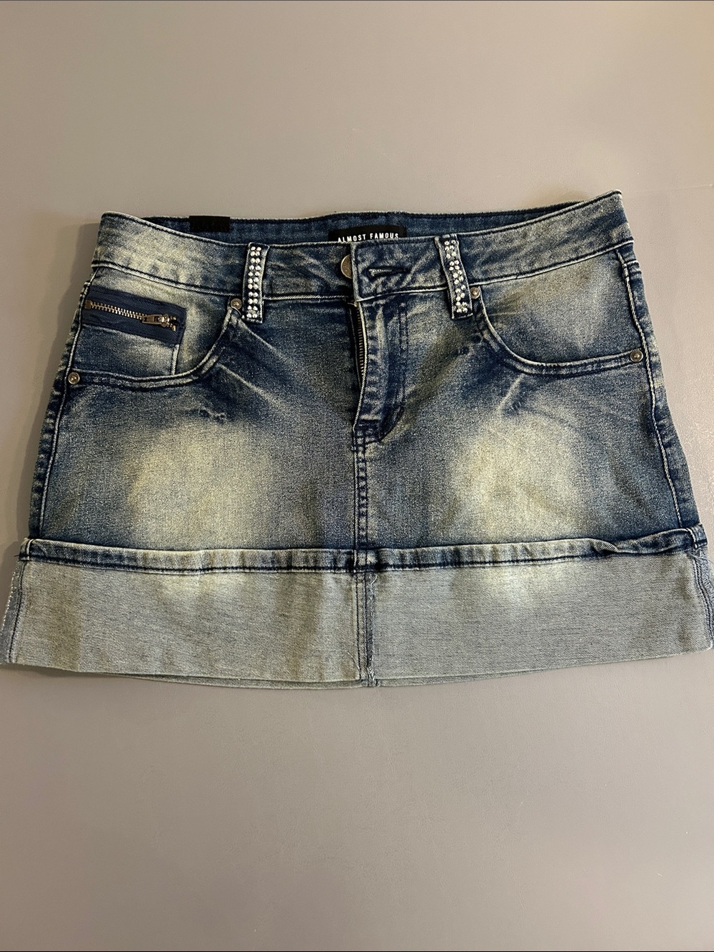 Almost Famous Distressed Light Blue Denim Mini Skirt with Rhinestone Belt Loops